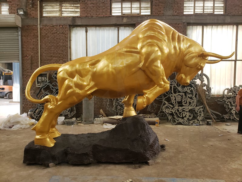 outdoor golden bull statue