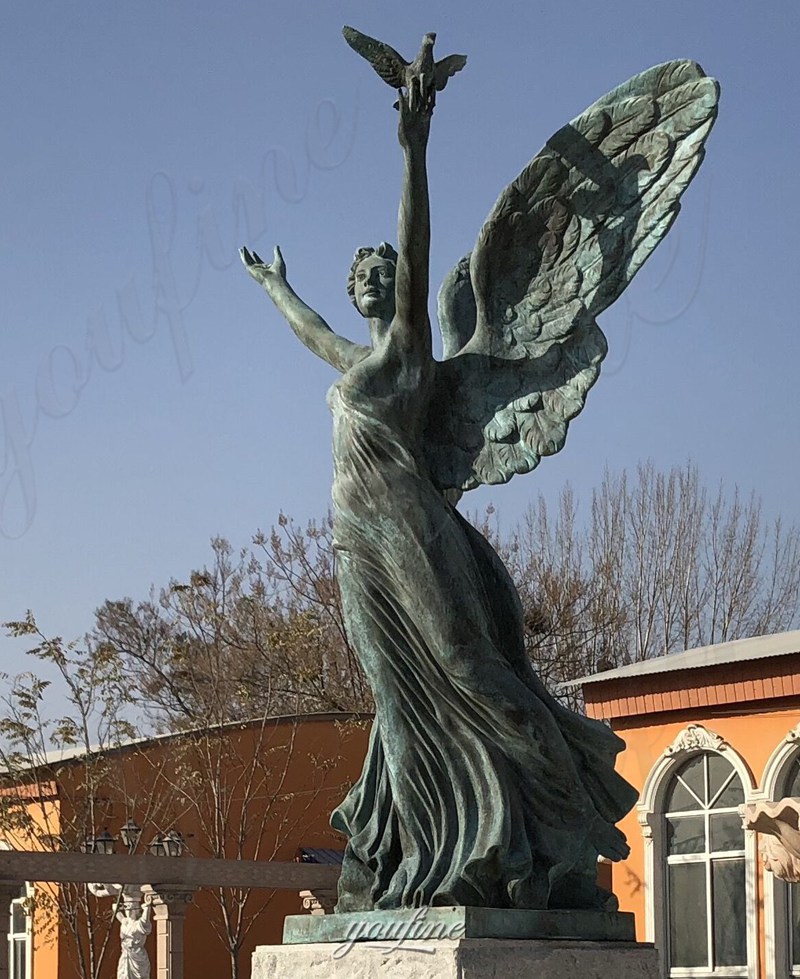 large bronze angel sculpture