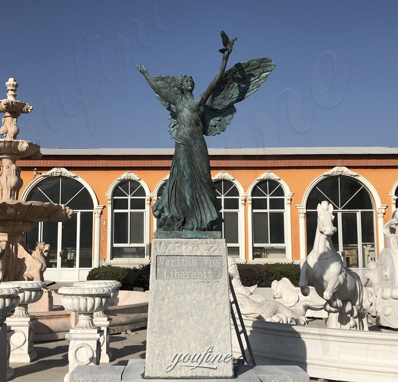 large bronze angel statue with base