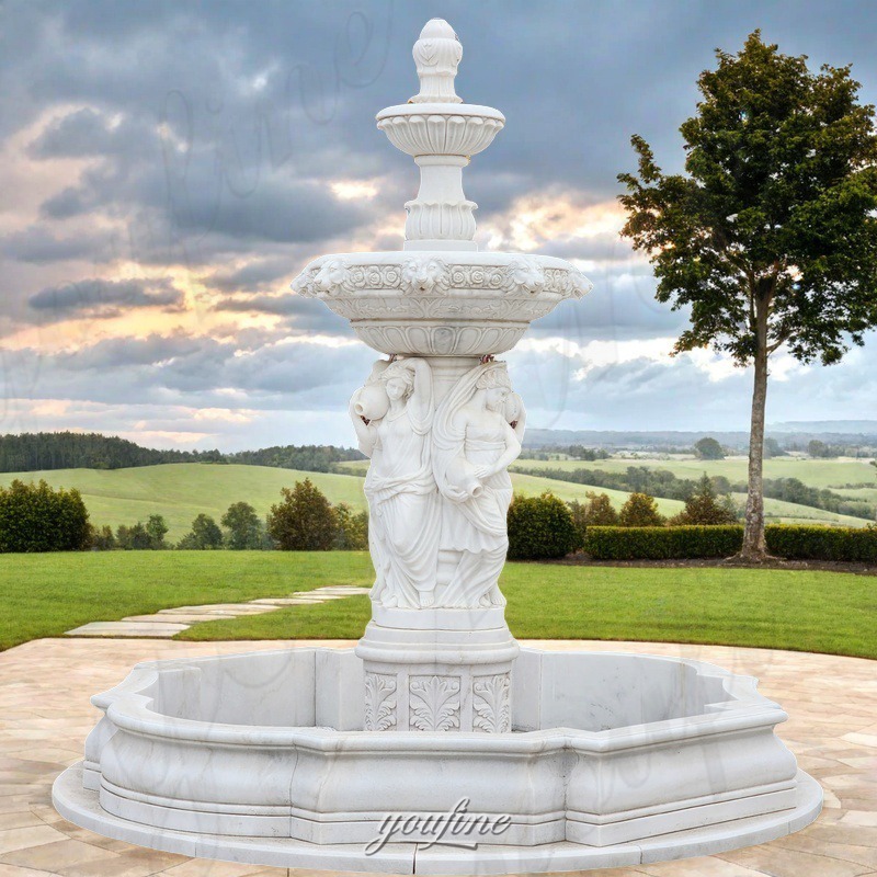 lady statue water fountain in garden