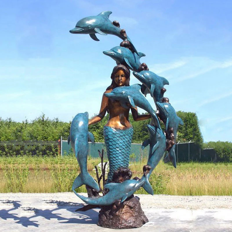 antique mermaid statue