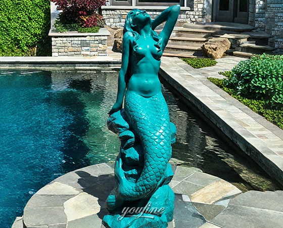 bronze sitting mermaid statue