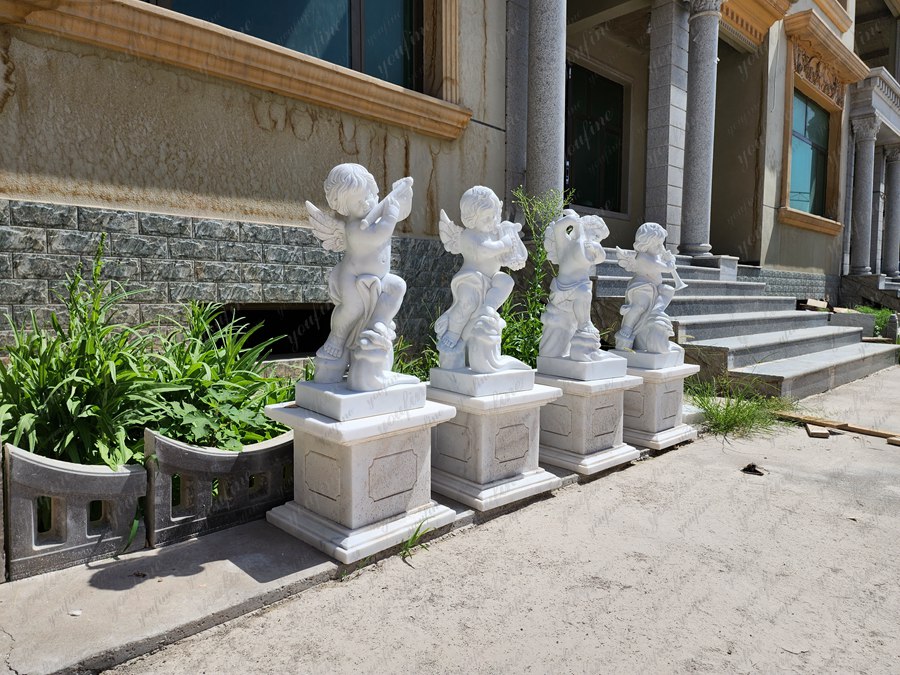 marble statues of cherubs (3)