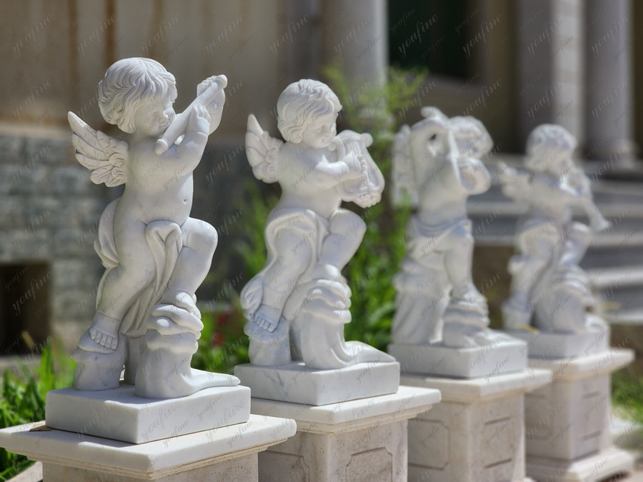 marble statues of cherubs (4)