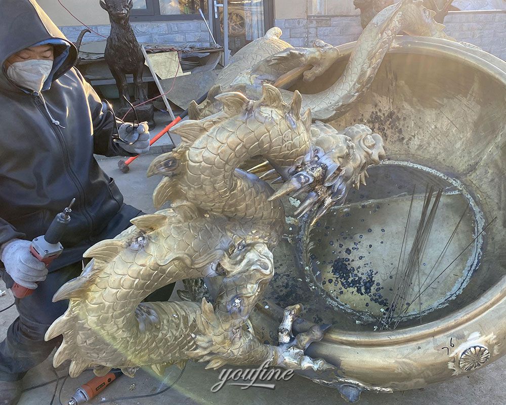 Bronze dragon fountain polishing