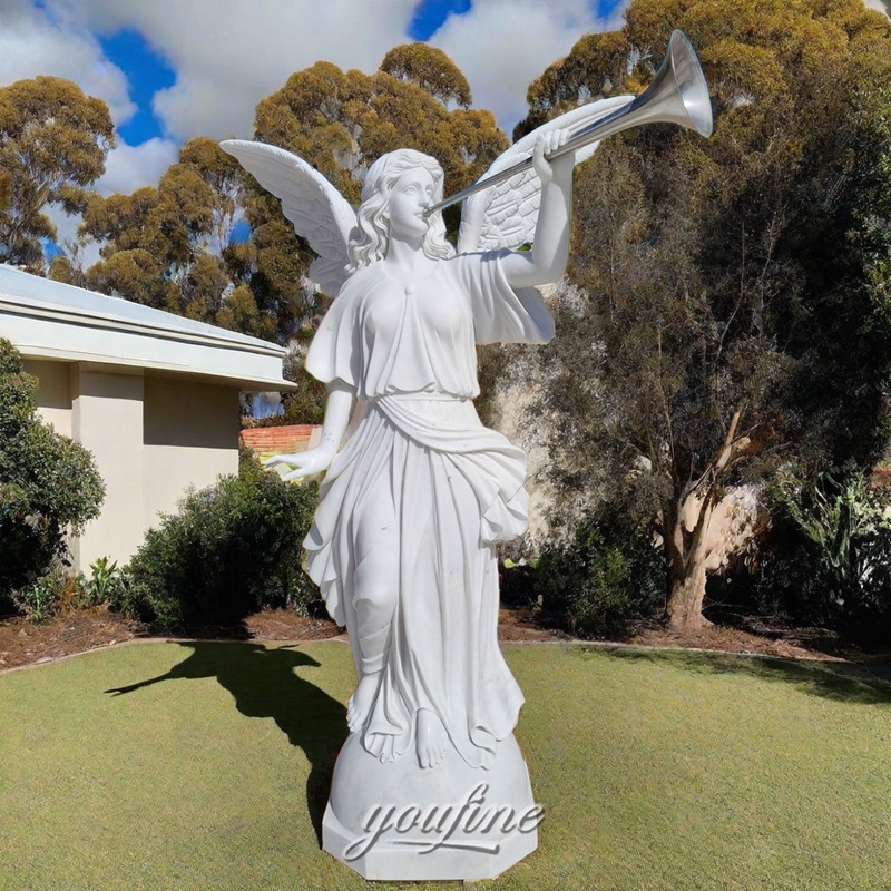 marble angel with trumpet statue