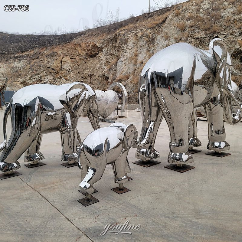 stainless steel elephant family sculpture