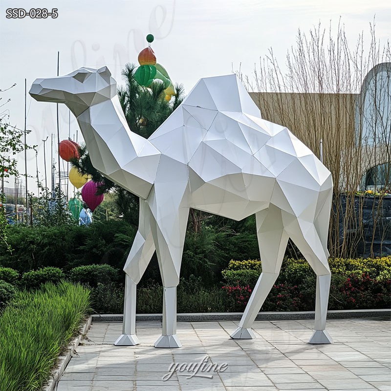 large white metal camel statues