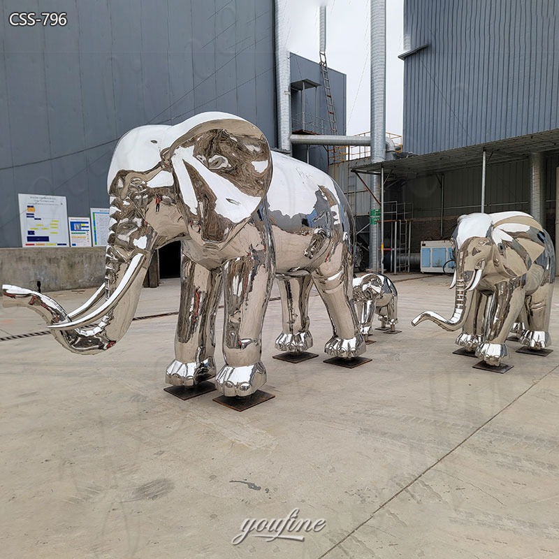 metal elephant family sculpture