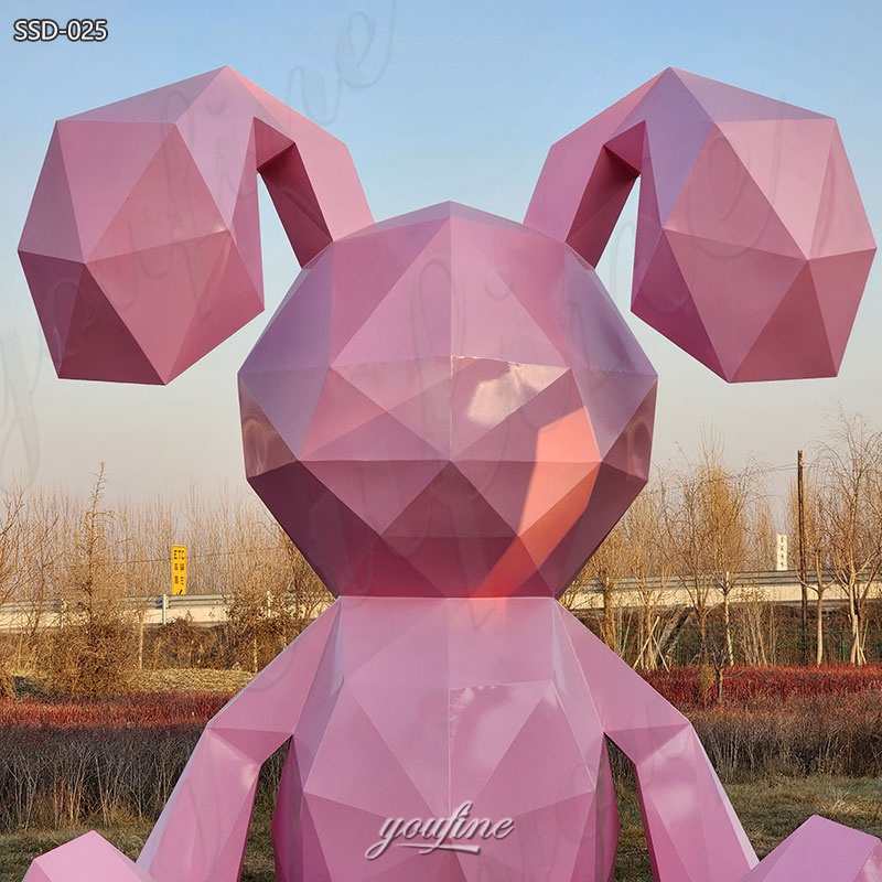 pink metal rabbit statue