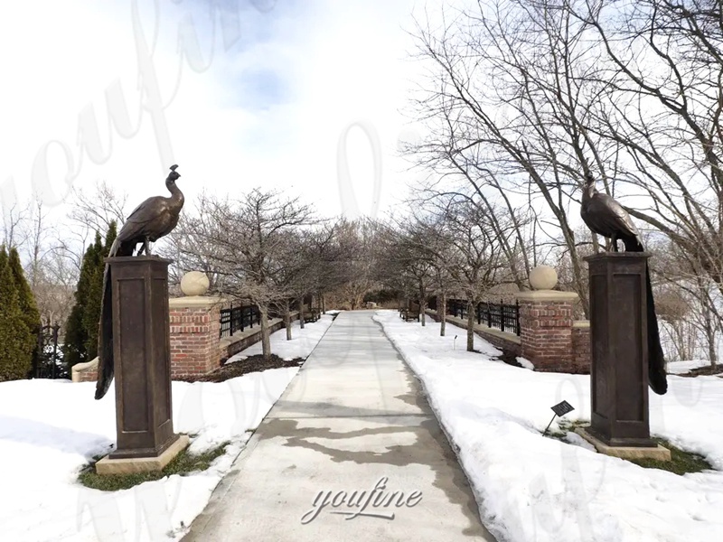 bronze peacock sculpture in the entrance