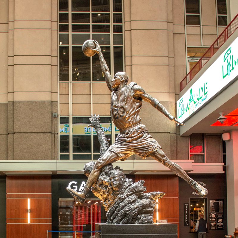 bronze basketball player sculptures