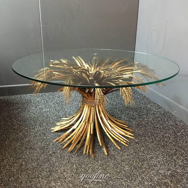 bronze coffee table with palm tree