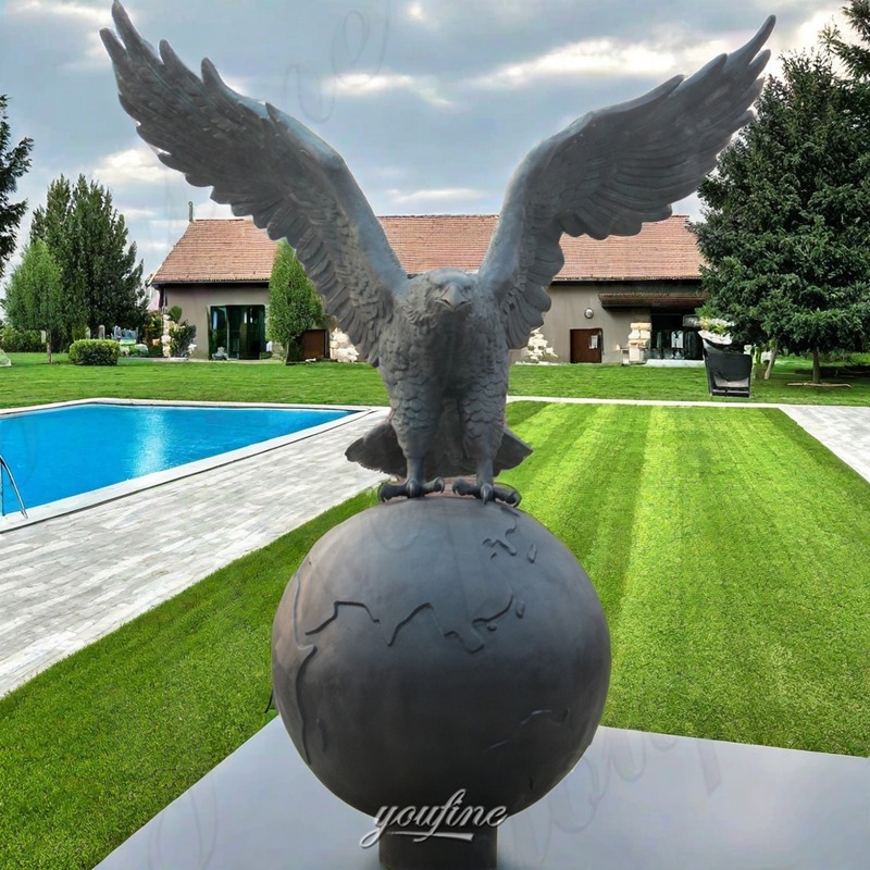 eagle on ball statue