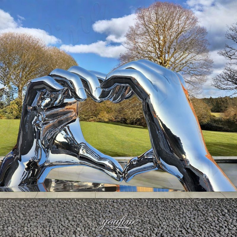 large metal hand sculpture