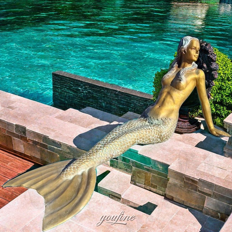 Mermaid Sculpture Sitting on the Rock