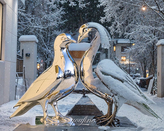 Metal Pigeon Sculpture in winter