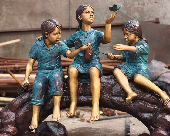 bronze boy and girl statue (5)