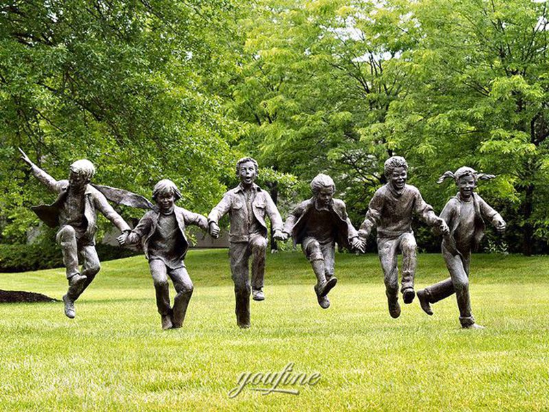 bronze boy and girl statues