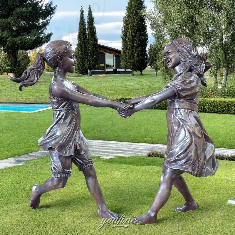 bronze children playing sculpture