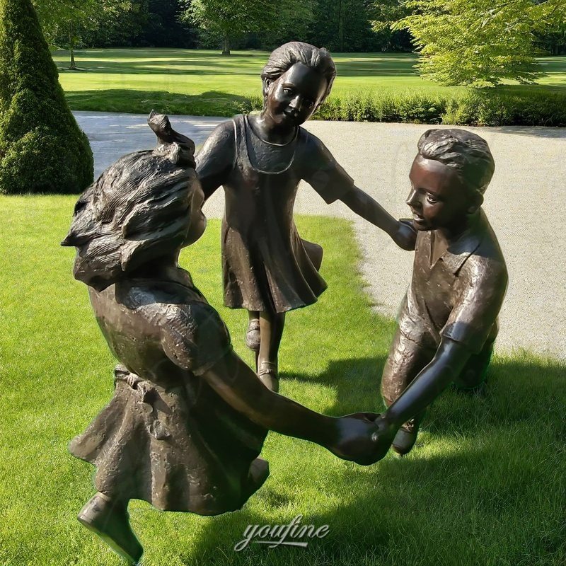 bronze children playing statue