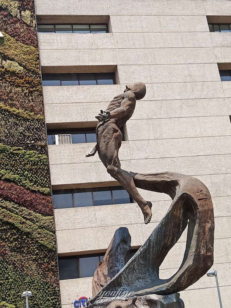 bronze falling man statue