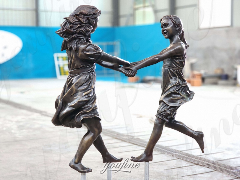 children playing sculpture in factory