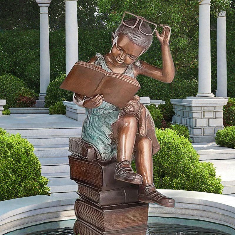 garden statue girl reading book