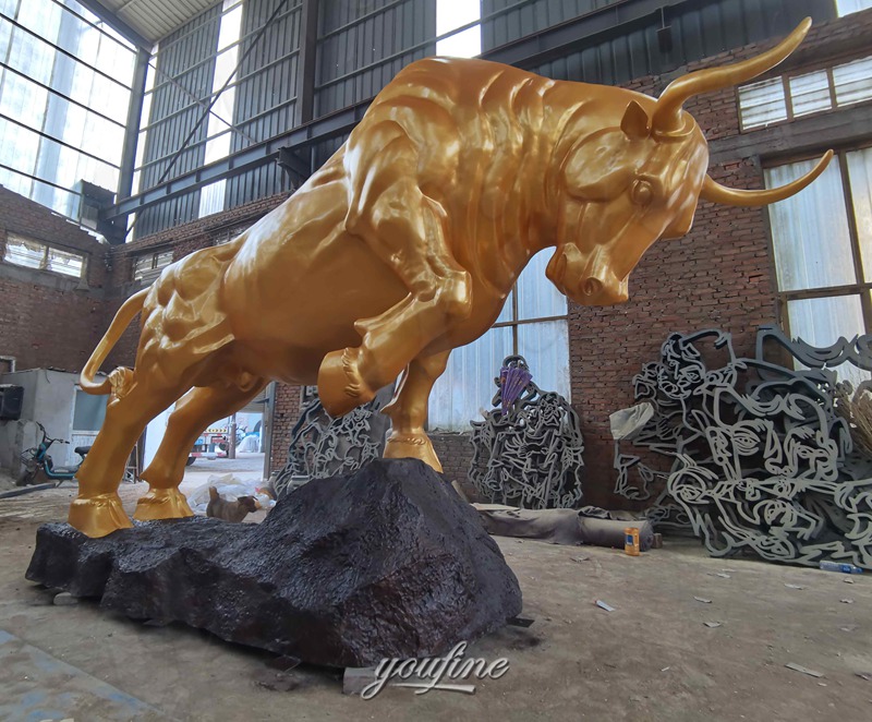 bronze gold bull statue