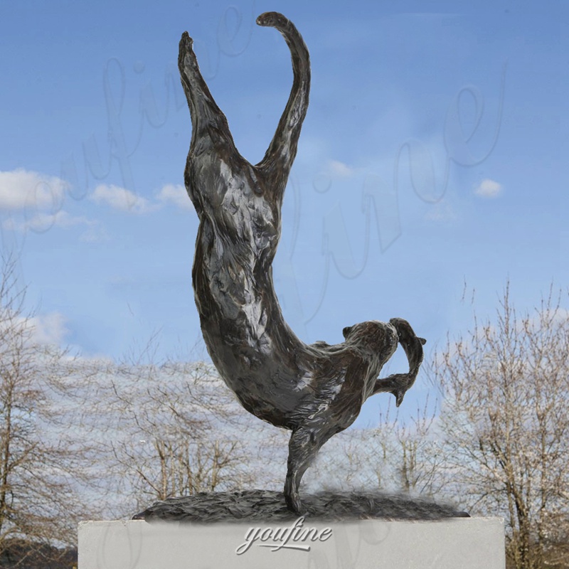 bronze otter garden statue