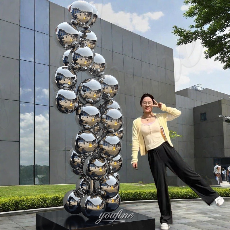 large stainless steel sphere statue