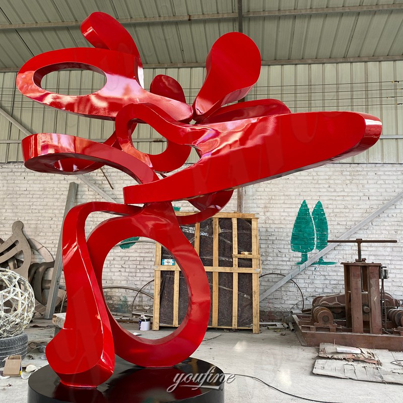 metal abstract red sculpture